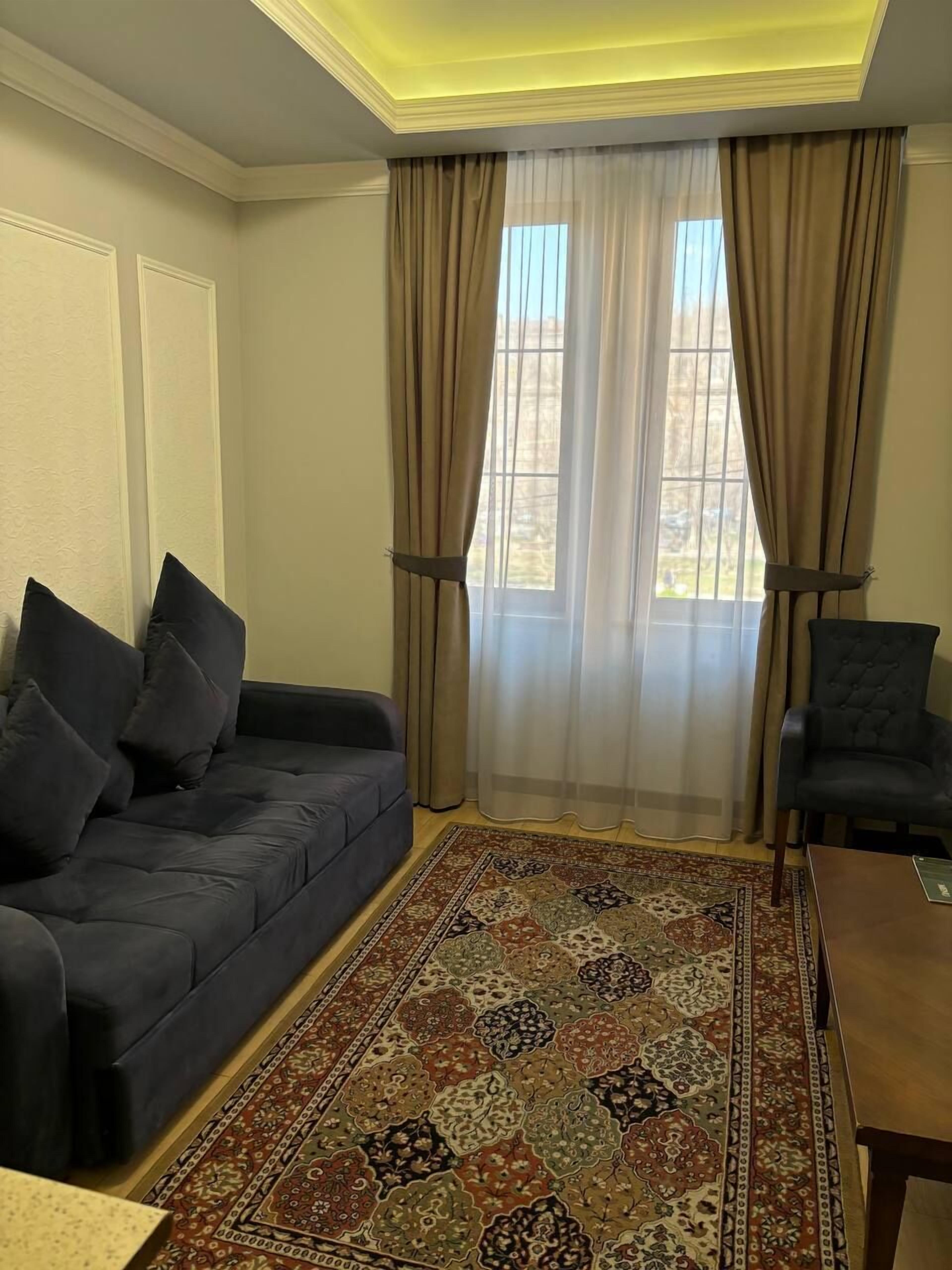 apartment, garden view | premium bedding, in-room safe, blackout curtains, soundproofing