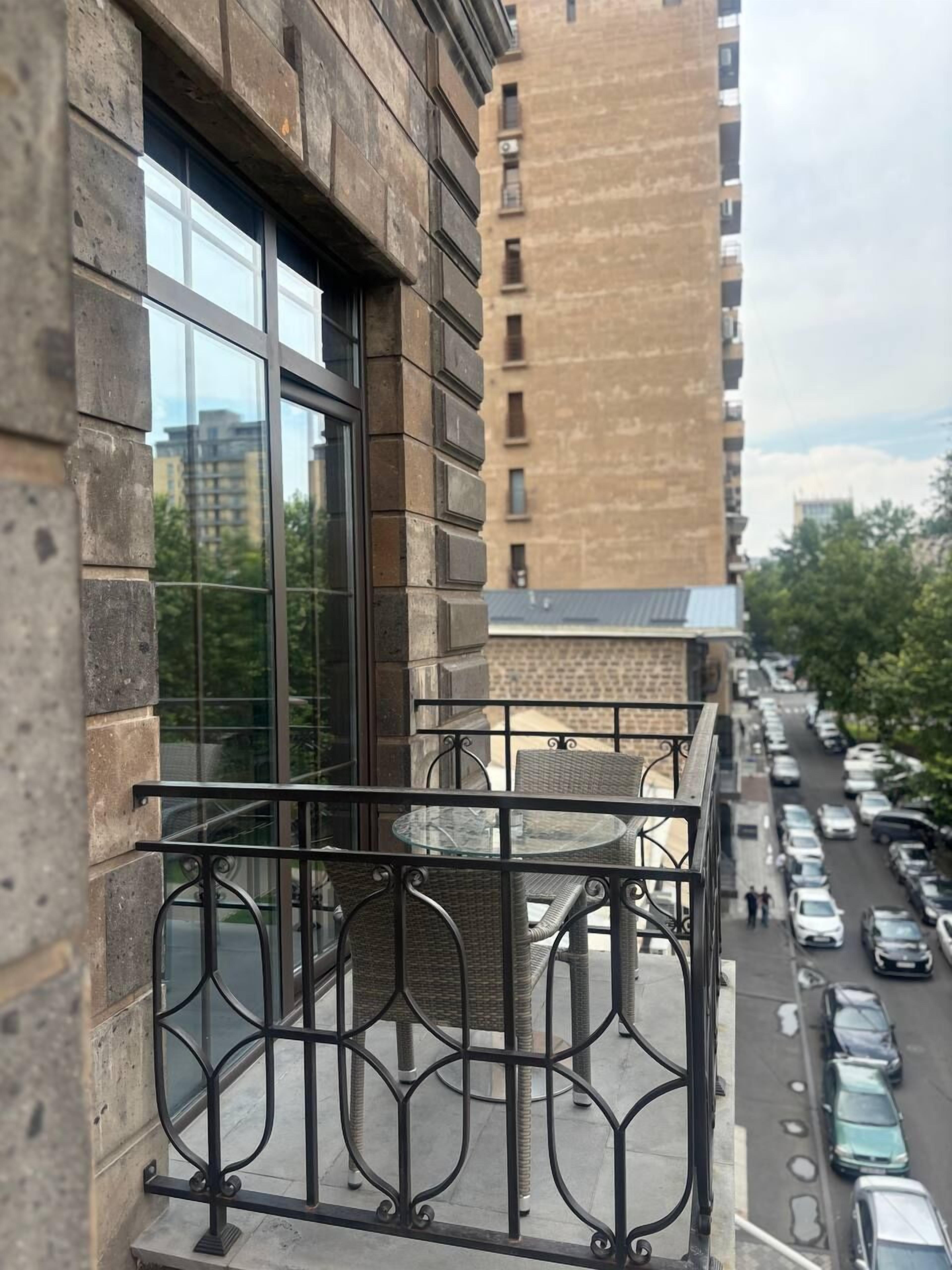 apartment, balcony, garden view | premium bedding, in-room safe, blackout curtains, soundproofing