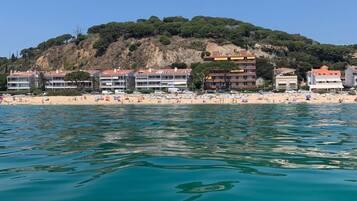 On the beach, sun loungers