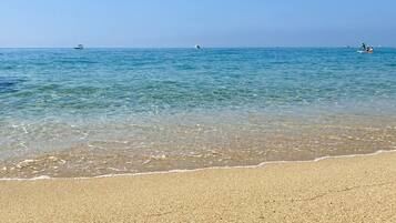 On the beach, sun loungers