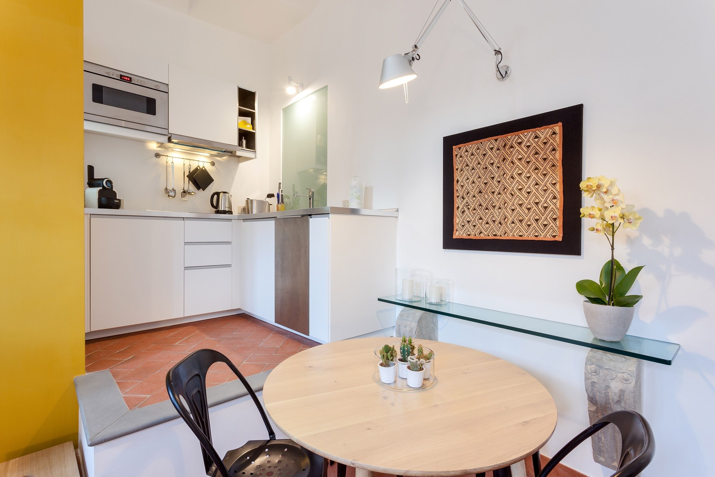 Fridge, stovetop, dishwasher, coffee/tea maker