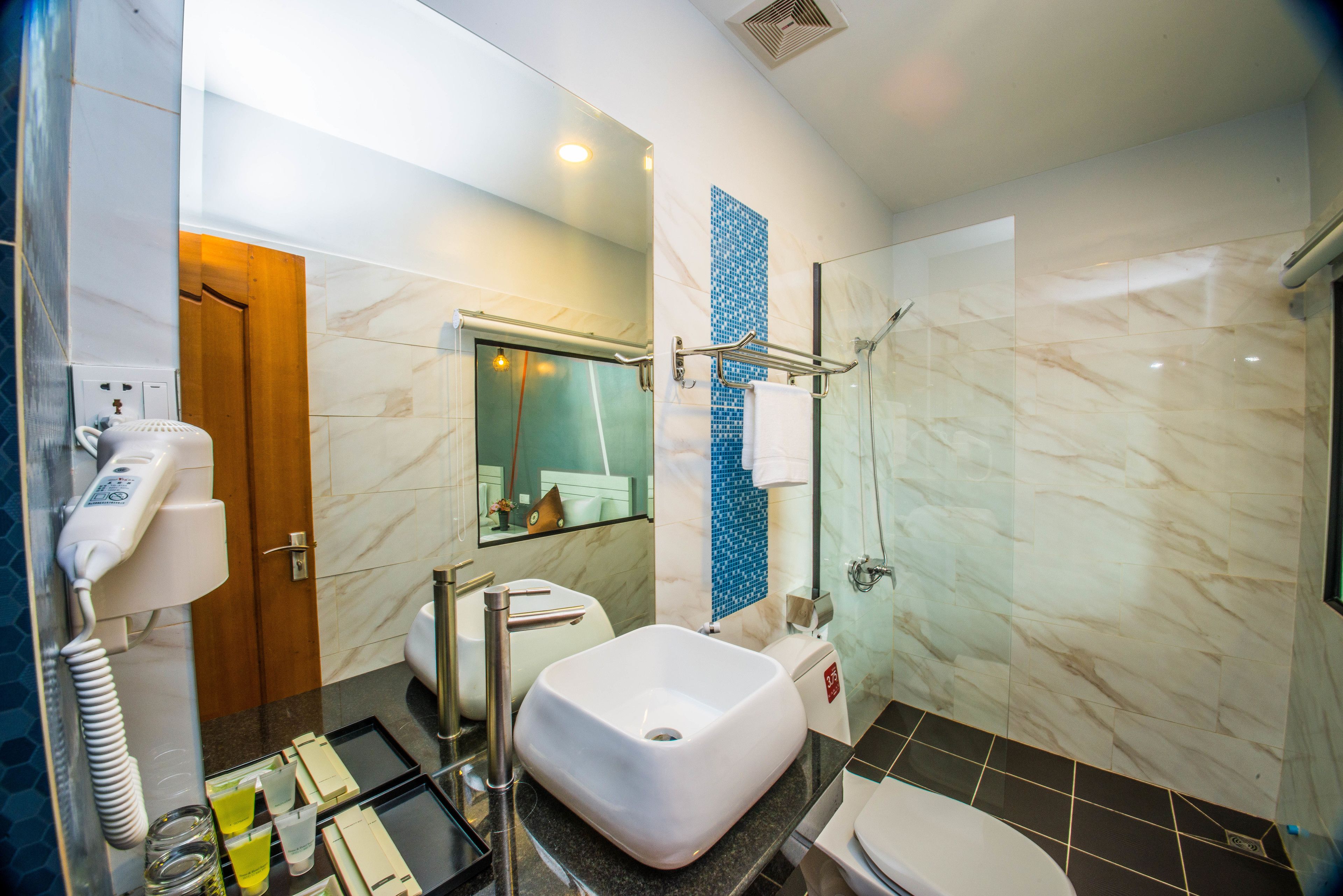 shower, free toiletries, hair dryer, slippers