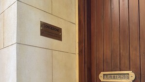 A wooden door with a 'LETTERS' sign and a 'CONCEZIONE' sign on the adjacent wall. - Historic center, 2 rooms, 2 toilets, sky terrace, lift, free high speed Wi Fi (PALERMO)