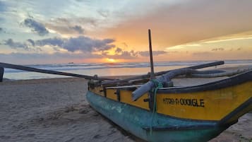 Beach nearby, white sand, beach shuttle, beach umbrellas