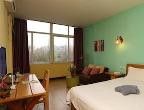 Habitación doble Deluxe | Escritorio, cortinas blackout y wifi gratis 