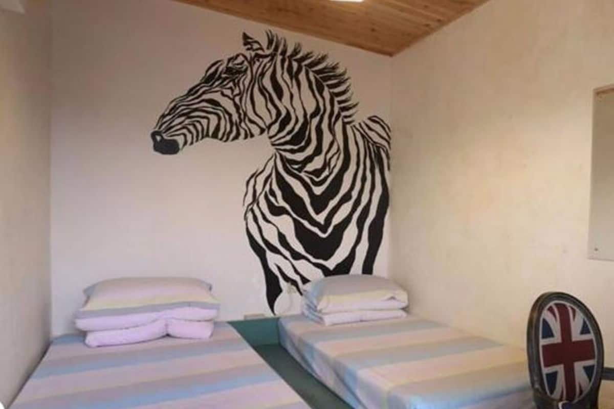 Standard-Zweibettzimmer, Gemeinschaftsbad | Schreibtisch, Verdunkelungsvorhänge, kostenloses WLAN