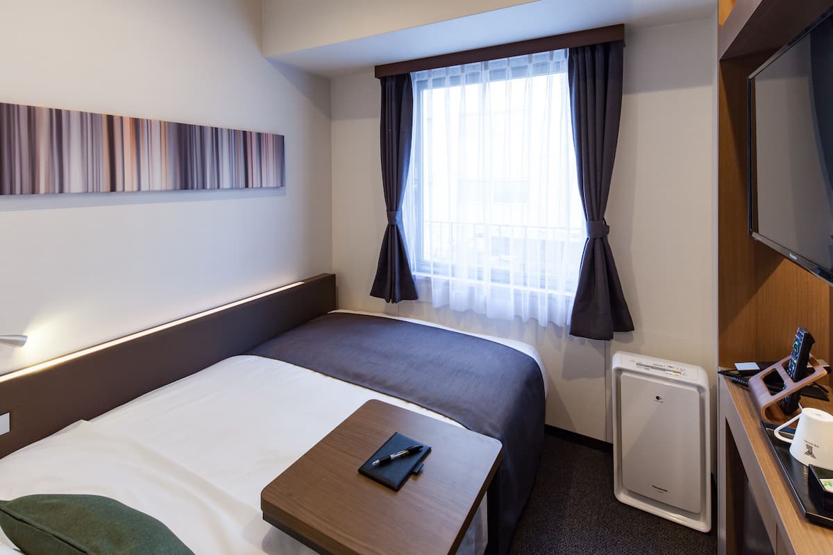 Semi Double Room | Down comforters, in-room safe, desk, blackout drapes
