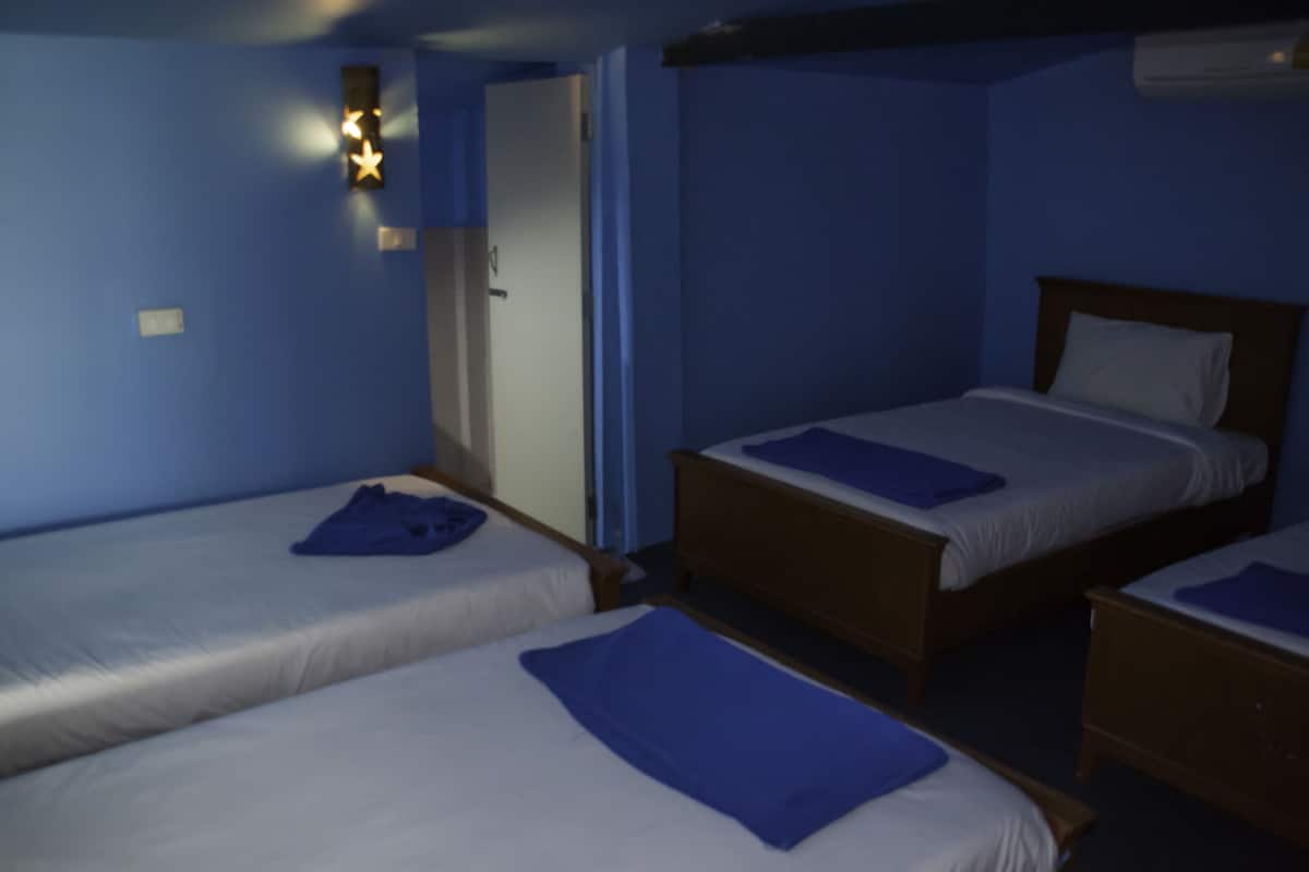 Basic Quadruple Room, Multiple Beds, Non Smoking | Free WiFi, bed sheets