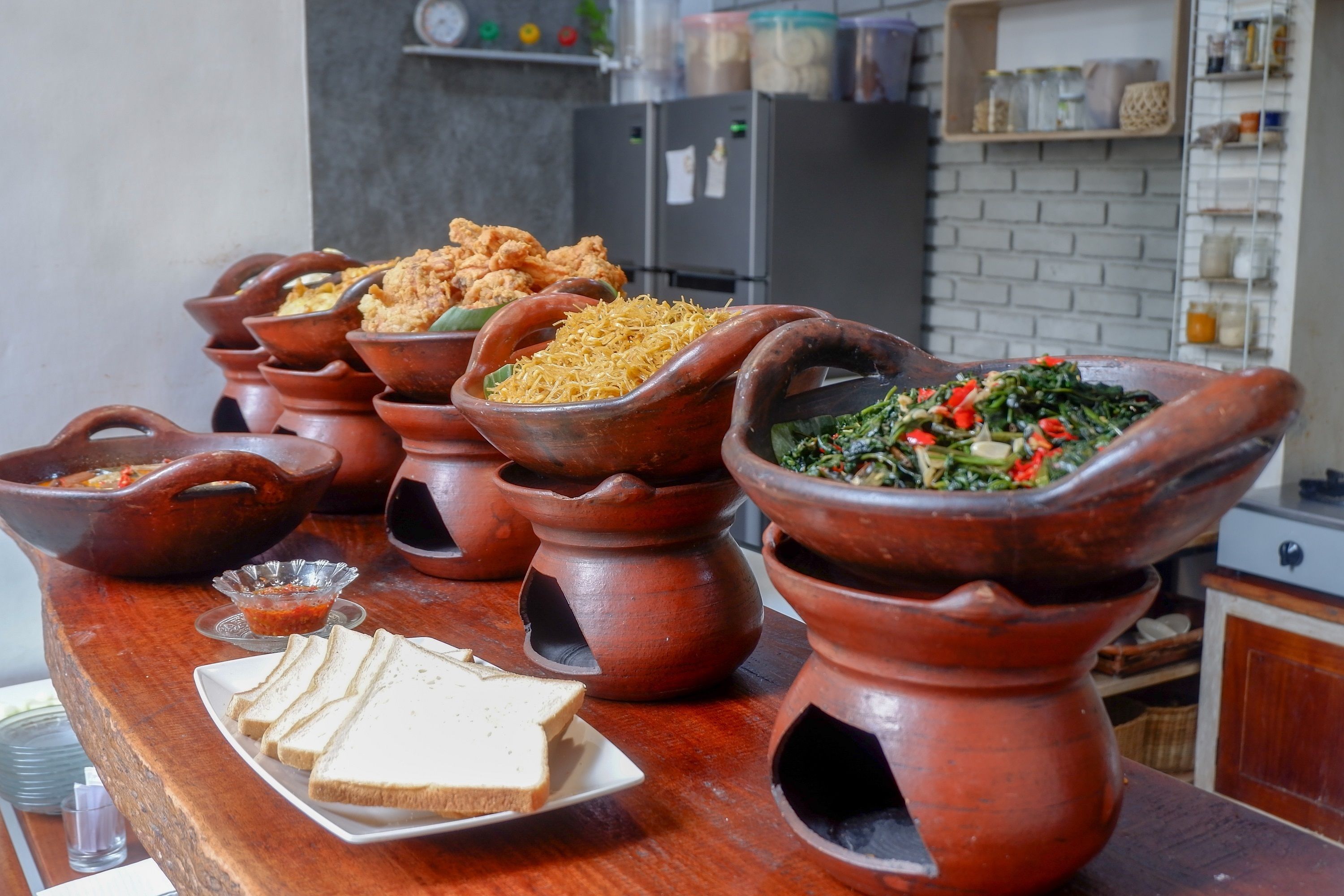 Breakfast, lunch, dinner served; local cuisine 