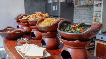 Breakfast, lunch, dinner served; local cuisine