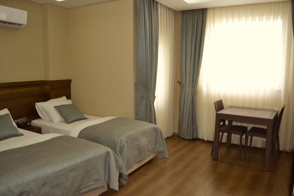 Family Room | Minibar, in-room safe, blackout drapes, soundproofing