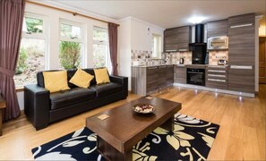 Appartement supérieur | Aire de séjour | Téléviseur à écran plat