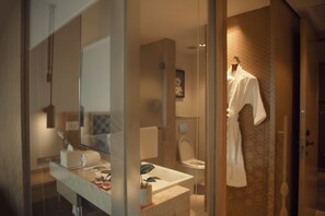 Eco-friendly toiletries, hair dryer, bathrobes, slippers
