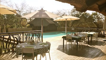 2 outdoor pools, pool umbrellas, pool loungers