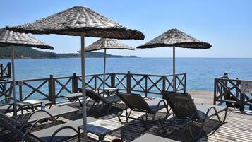 Private beach nearby, sun-loungers, beach umbrellas, beach bar