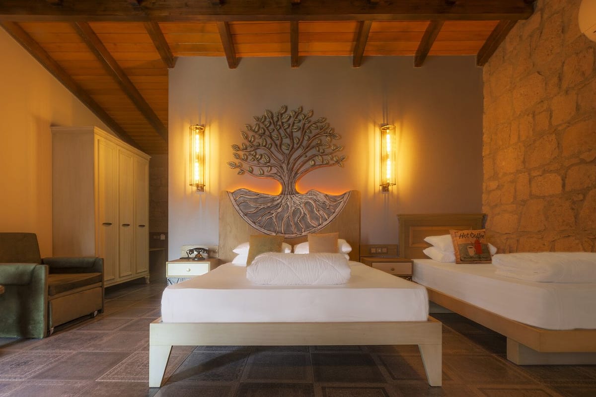 family room, balcony, sea view | 2 bedrooms, minibar, in-room safe, desk