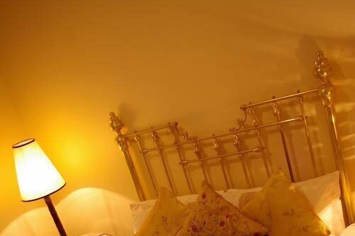 Family Room, Garden View | Minibar, iron/ironing board, free WiFi