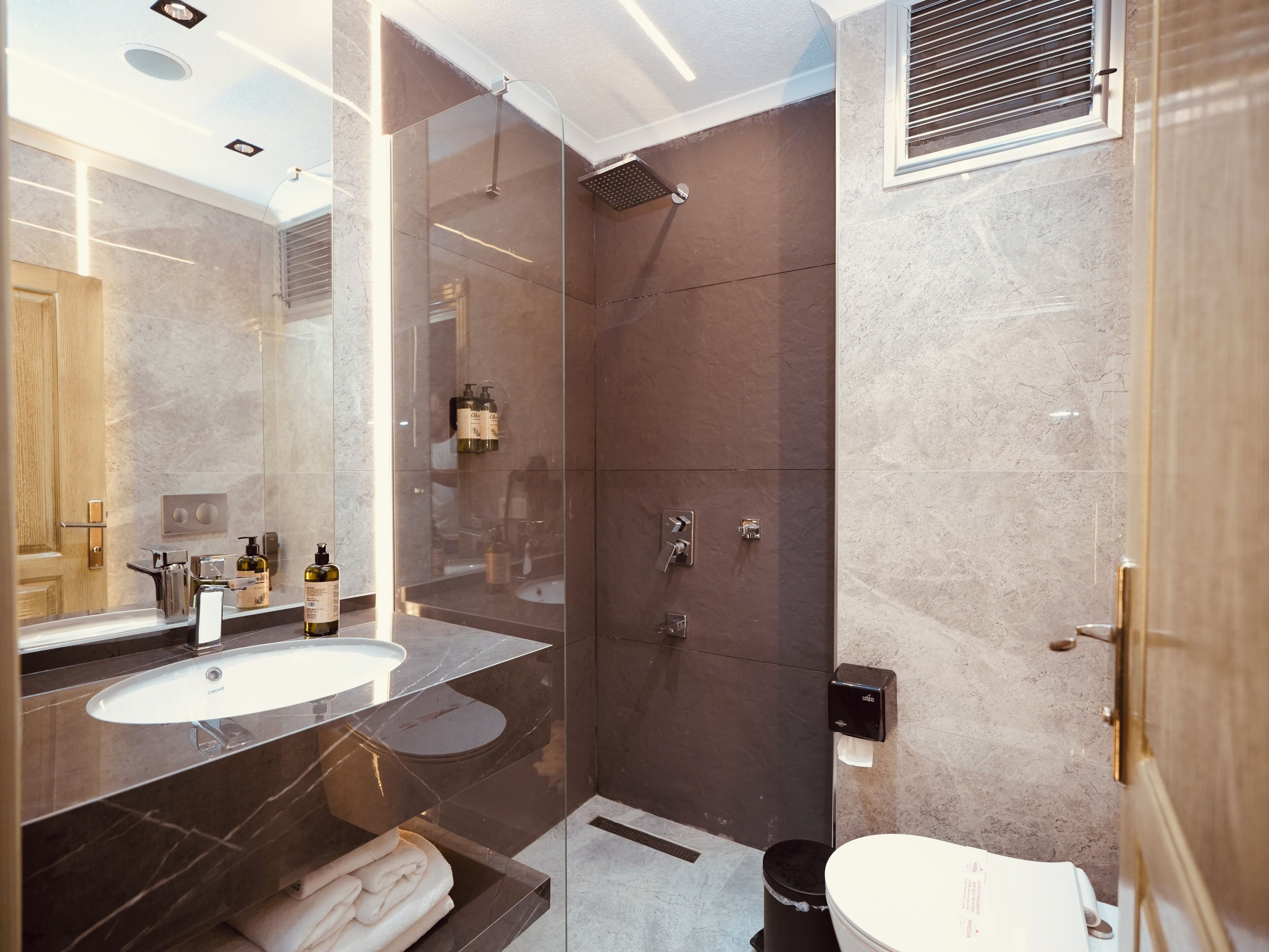 Shower, free toiletries, hair dryer, slippers