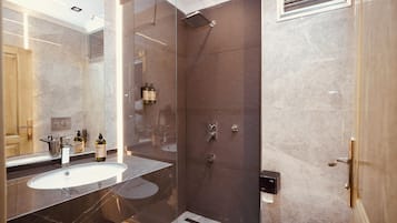 Shower, free toiletries, hair dryer, slippers