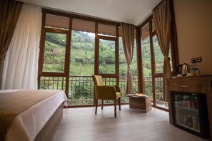 Suite Deluks | Kedap suara, Wi-Fi gratis, dan seprai linen