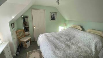1 bedroom, desk, iron/ironing board, travel cot