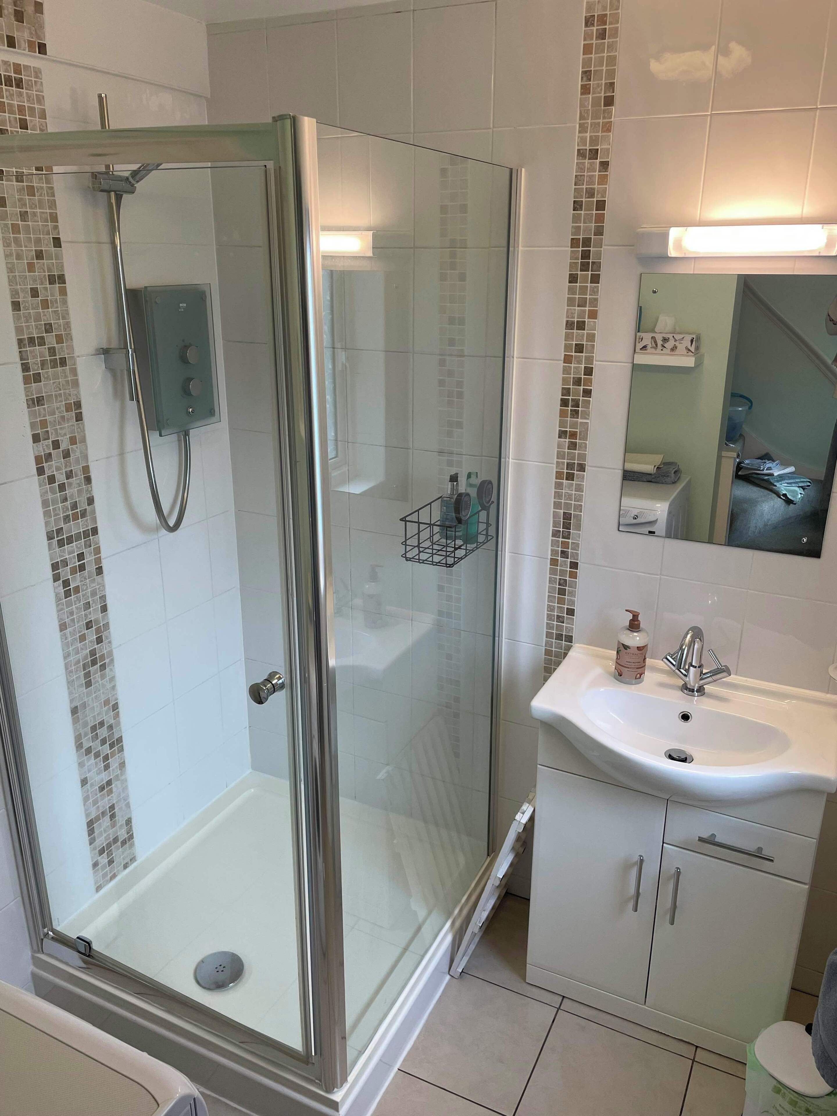 Shower, hair dryer, bathrobes, towels