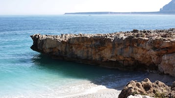 Sillas reclinables de playa, toallas de playa