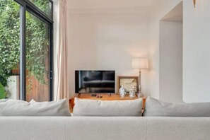 Smart TV, DVD player, books, music library