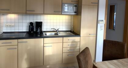 Apartamento moderno para 4 pers., Cerca de la playa, balcón orientado al sur, conexión Wi-Fi