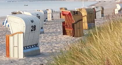 Auringonlaskua ja meren ääniä osallisuutta