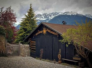 Experience the charm of Schrunsblick, nestled among snow-capped mountains.