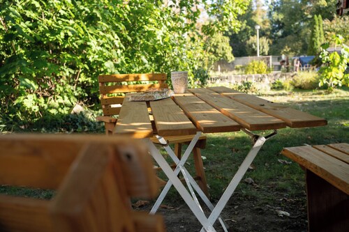 In the center of Quedlinburg, quiet and with a view of the garden and parking space 