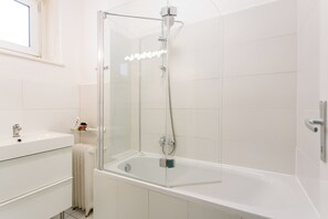 Hair dryer, towels, soap, shampoo