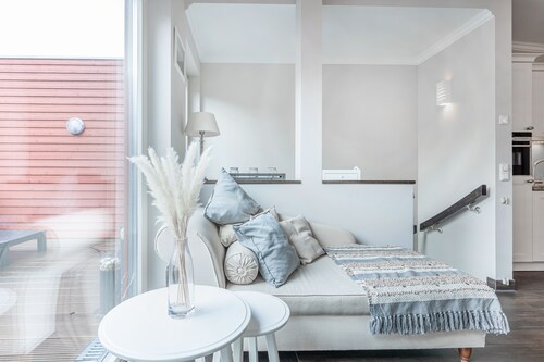 5 * Gallery apartment on the beach, 20m² south west roof terrace with outdoor fireplace, priv. sauna