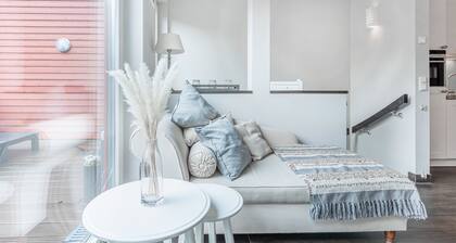 5 * Gallery apartment on the beach, 20m² south west roof terrace with outdoor fireplace, priv. sauna