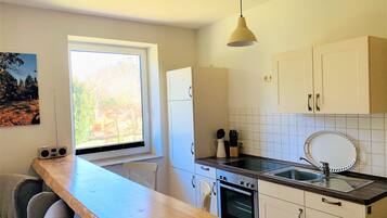 Kylskåp, ugn, spishäll och diskmaskin