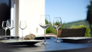 A table with wine glasses, a croissant, and a notebook. - L'OEUILLADE: calm and tranquility in Champagne (Œuilly)