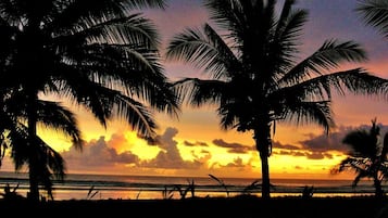On the beach, sun loungers, beach towels