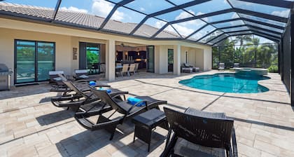 Villa de rĂȘve Cape Coral sur le canal au sud-ouest, construite en 2014, orientĂ©e plein sud, piscine + spa