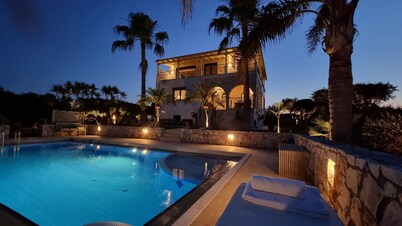 Luxury Villa with pool, located on a prominent hill, a few minutes to the sea.