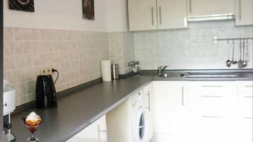 Fridge, stovetop, coffee/tea maker, toaster