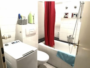 Hair dryer, towels, shampoo, toilet paper