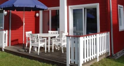 Maison de vacances exclusive prÚs de la plage avec sauna, bain à remous, cheminée, WiFi et Wii