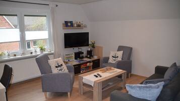 Smart-TV, Bücher, Stereoanlage