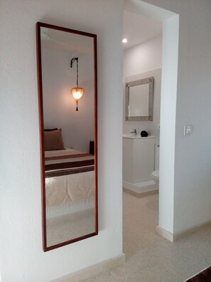 Apartment, 1 Bedroom, Garden View (Adults Only) | Bathroom | Shower, rainfall showerhead, hair dryer, towels