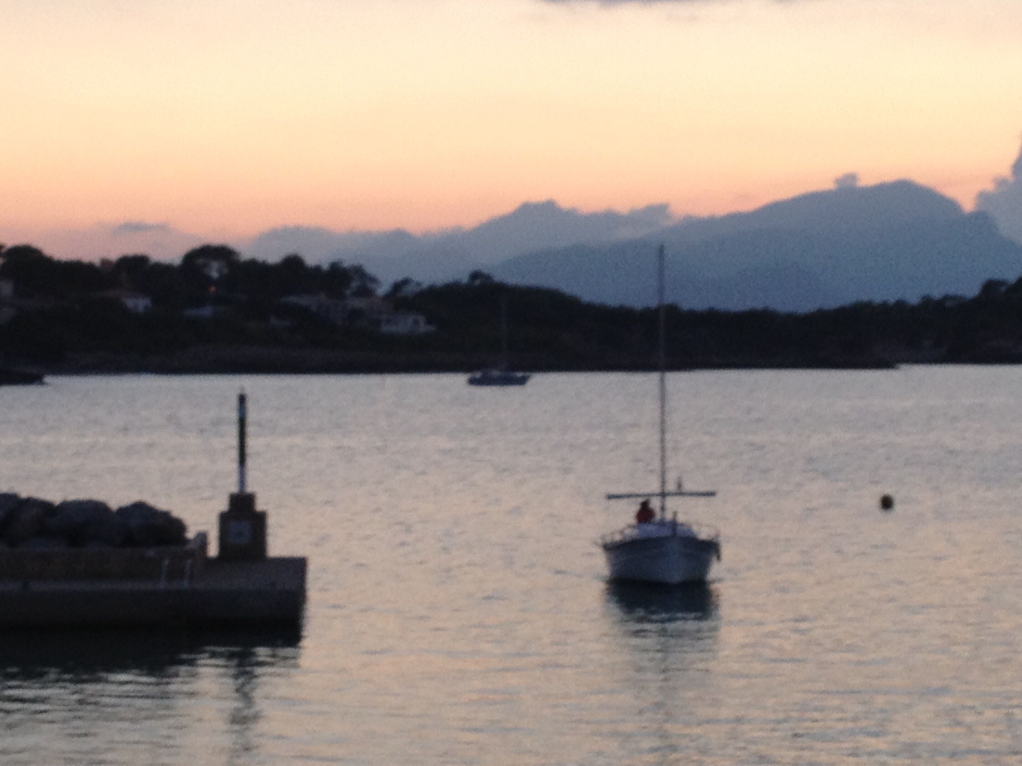 A harbor with boats and a dock.