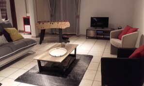 TV, DVD player, table football, books
