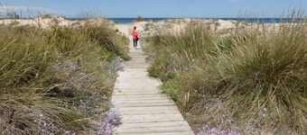 Maison confortable, directement sur la plage et sur le golf dans une urbanisation calme