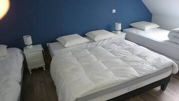 2 bedrooms, memory foam beds, iron/ironing board, travel crib