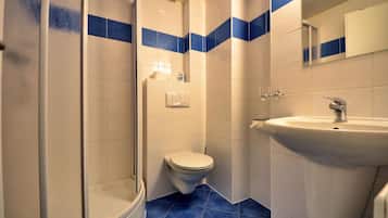 Shower, free toiletries, hair dryer, towels